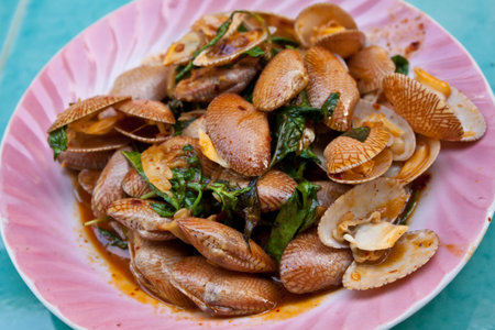 Clams fried with roasted chili pasteの写真素材