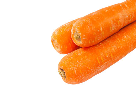 Closeup Three orange Carrot vegetable on white backgroundの写真素材