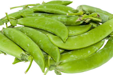 Closeup of group green peas on white backgroundの写真素材