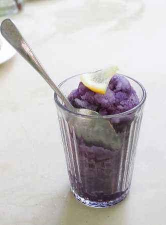 Closeup of purple butterfly pea and lemon ice creamの写真素材