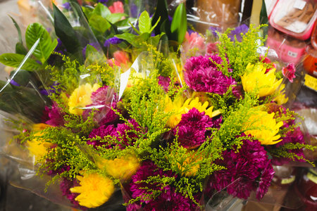 Close up Purple and Yellow flower in the shopの写真素材