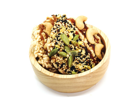 Closeup of two Sweet Crispy Rice Cracker with several cereal on wood cupの写真素材