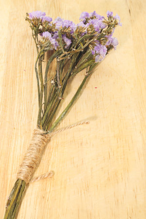 Macro of Single of light violet statice flower background use for decoration on small brown rope sackの写真素材