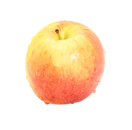 Closeup of single apple and water drop on white backgroundの写真素材