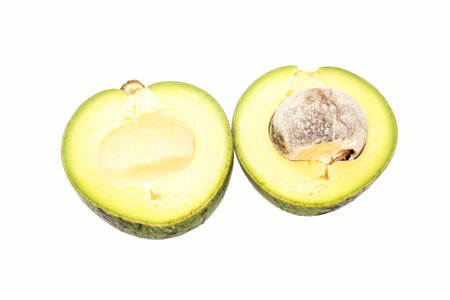 Slice Single of green thai avocado on white background