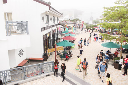 NONGPING, HONGKONG - 29 March 2019  Close up of People enjoy shopping and sight seeing at Nong Ping village on 29 March, 2019.JPGのeditorial素材