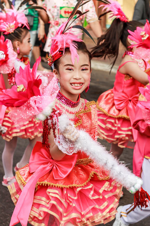SAMUTSAKORN, THAILAND-December, 26, 2019: Focus little portrait smile child Drum Mayer school students paradeのeditorial素材