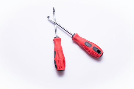 Red, Flat Screwdriver and Cross - Reset Head Screwdriver  の写真素材