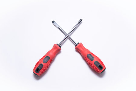 Red, Flat Screwdriver and Cross - Reset Head Screwdriverの写真素材
