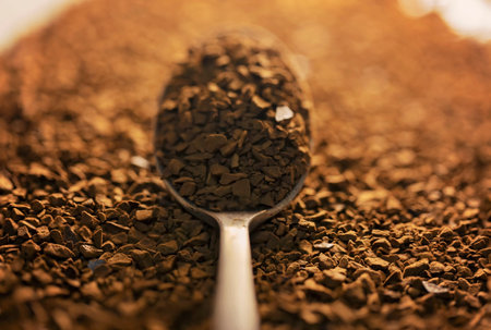 Close up of instant coffee in a spoon. Selective focus.の写真素材