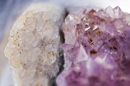 Amethyst geode split in half.Looking inside a Amethyst geode,crystal gemstone.Detailed close up of...