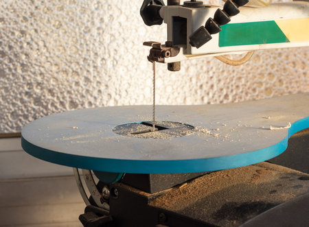Dusty wood cutting band saw close viewの写真素材