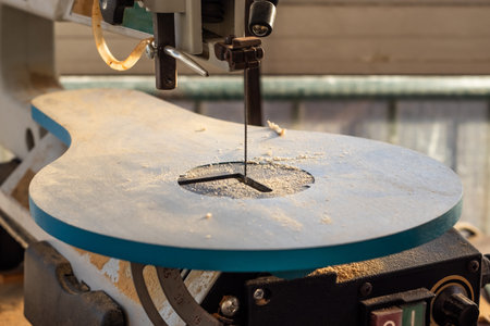 Dusty wood cutting band saw close viewの写真素材