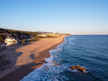 Aerial view of El Maresme coast. Beach named Platja del CavallÃ³ in Arenys de Mar, Cataloniaの写真素材