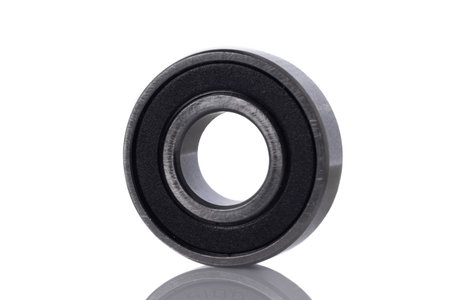 Shielded internal ball bearing isolated on whiteの写真素材