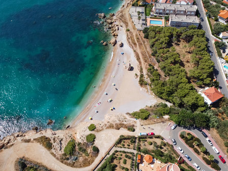 Aerial view of a small beach in the mediterranean sea. Cala del Pilar, north of Vinaros city in Valencia, Spain.の写真素材