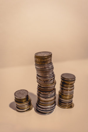 Tower made of coins representing money, wealth and finance.の写真素材