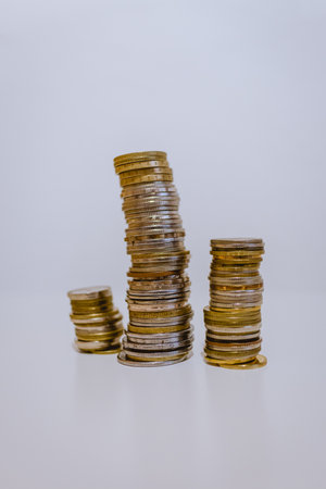 Tower made of coins representing money, wealth and finance.の写真素材