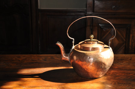 copper teapot and shadowの写真素材
