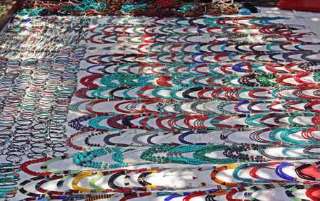 Handcrafted necklaces and other accessories displayed at the Wednesday flea market in Anjuna beach...