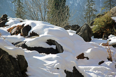 Close up of snow covered rocks from the Himalayan mountain ranges near Manali in Indiaの写真素材