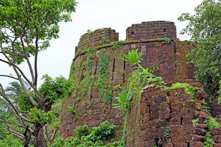 Remains of one of the turrets of Cabo de Rama Fort in Goa, India. A centuries old fort, last owned by the Portuguese during their occupation of Goa.の写真素材