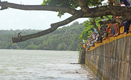 Goa, India - August 15, 2016: Anglers participate in the 17th Annual All Goa Fishing Competition and Sea Food Festival at Ribandar in Goa, India. This is an annual event held on the banks of River Mondovi.のeditorial素材