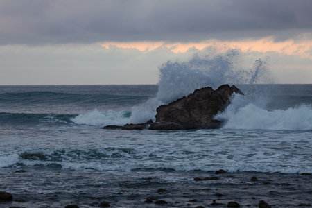 Wave Crashing against a Rock in the Pacific Oceanの写真素材