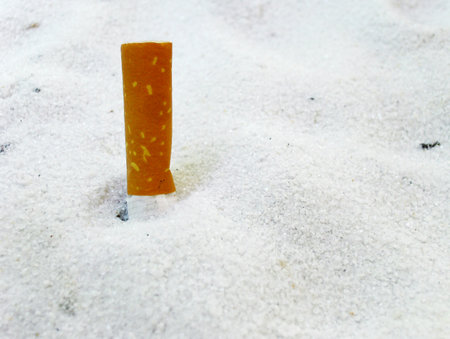 A cigarette in sand ashtrayの写真素材