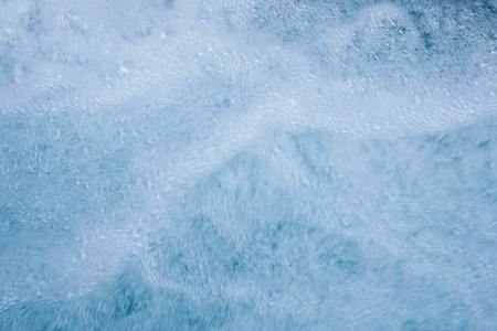 The water flow with air bubblesの写真素材