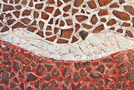 Mosaic wall decorative ornament from broken ceramic tilesの写真素材