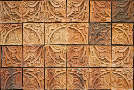 The beautiful brick wall with Thai flower line patternの写真素材