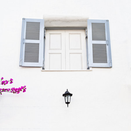 Vintage window and lampの写真素材