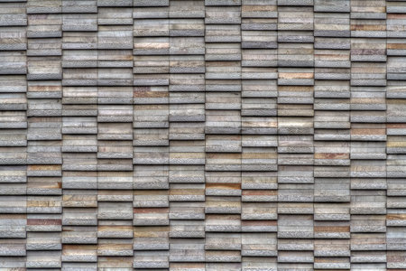 Modern mosaic wall constructed with stone platesの写真素材