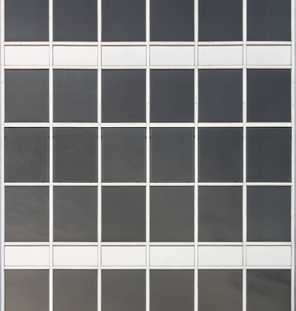 Glass walls and windows of a modern office building