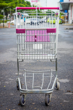 Shopping cart at supermarket parking lotの写真素材