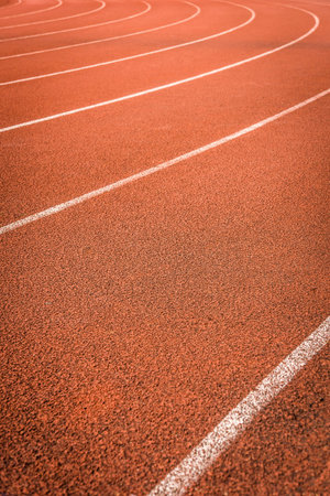 A running racetrack constructed with red rubber coverの写真素材