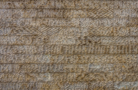 Natural stone tiles wall for background and texture
