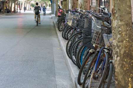 Bicycles on footpath of the roadsideの写真素材