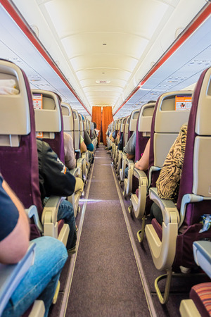 Walkway, passenges and seats an airplaneのeditorial素材