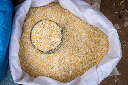 A sack of Thai rice grains in fresh market. Rice is the staple for all classes in contemporary Southeast Asiaの写真素材