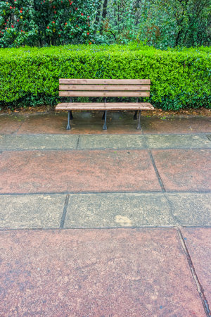 A wooden bench for relaxation in the garden of Memorial Hall garden of former president Dr.Sun Yat-senのeditorial素材
