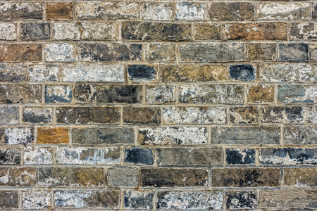 A vintage wall constructed with stones and rocks