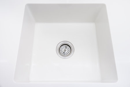 White granite stone wash basin and basin plug waste drainの写真素材