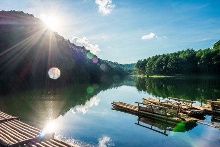 Natural landscape view of Huai Makhuea Som reservoir with bamboo lumber rafts in Mae Hong Son province Northern Thailandの写真素材
