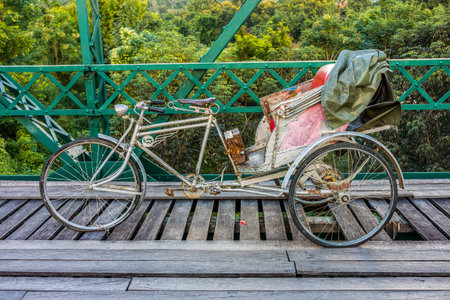 Vintage passenger tricycle is an old transportation in Thailand, Southeast Asiaの写真素材