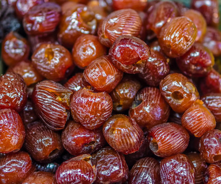 Heap of dried Chinese date Ziziphus jujuba for retail sale in Thailand food market. It is fruit preserves for long-term storage.の写真素材