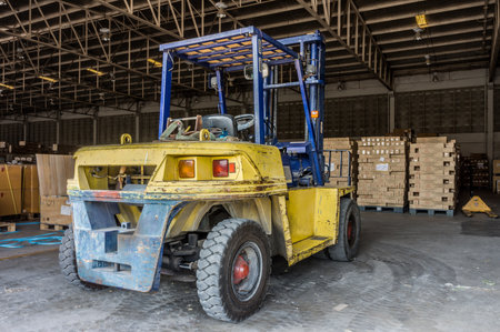 Rear of old forklift vehicle used in industrial warehouse. It is also called lift or fork truck.の写真素材