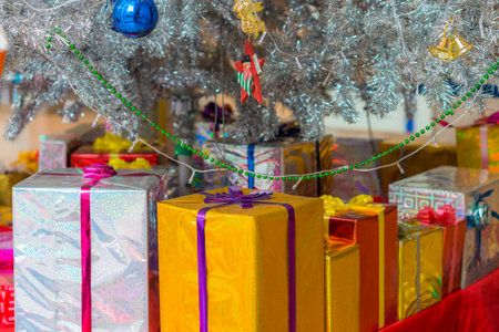 Many of Xmas gift boxes. The ornament and decoration under Christmas tree.の写真素材