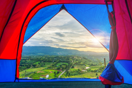 Scenery view from fabric tent with flare at Khao Ta-Khian Ngo Viewpoint. Location in Khao Kho District, Phetchabun, Thailand, Southeast Asia.の写真素材